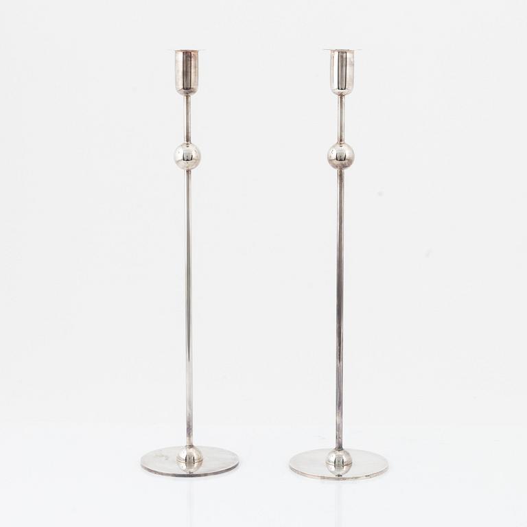 A pair of 'Kulan' candle sticks by Estrid Ericson for Firma Svenskt Tenn.