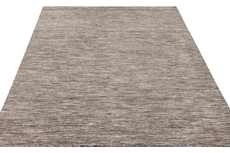 A flat weave carpet, c. 337 x 328 cm.