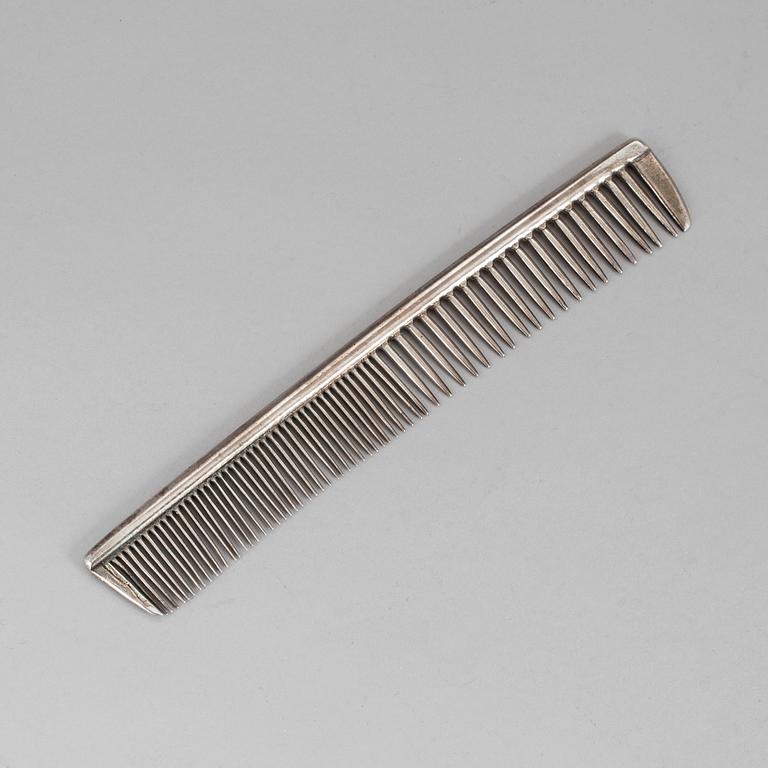 A silver comb by Gustaf Möllenberg, Stockholm, 1828. Vikt ca 62 grams.