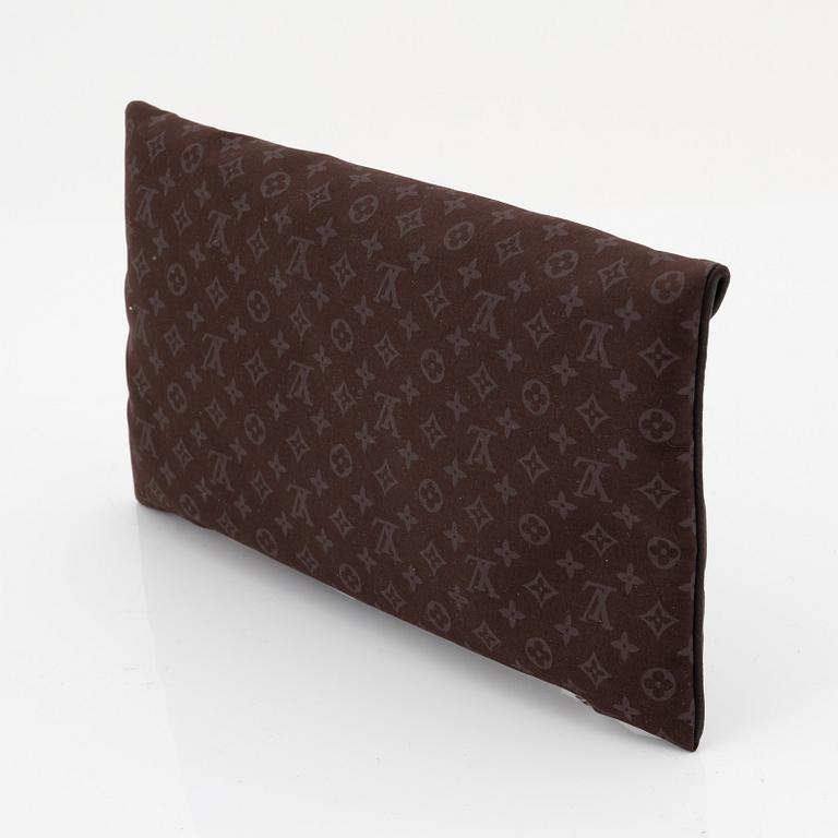 Louis Vuitton, a monogram "Trousse kit de voyage' travel kit with inflatible pillow and eye mask.