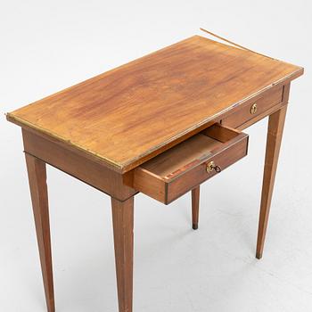 A late Gustavian style mahogany table with drawers.