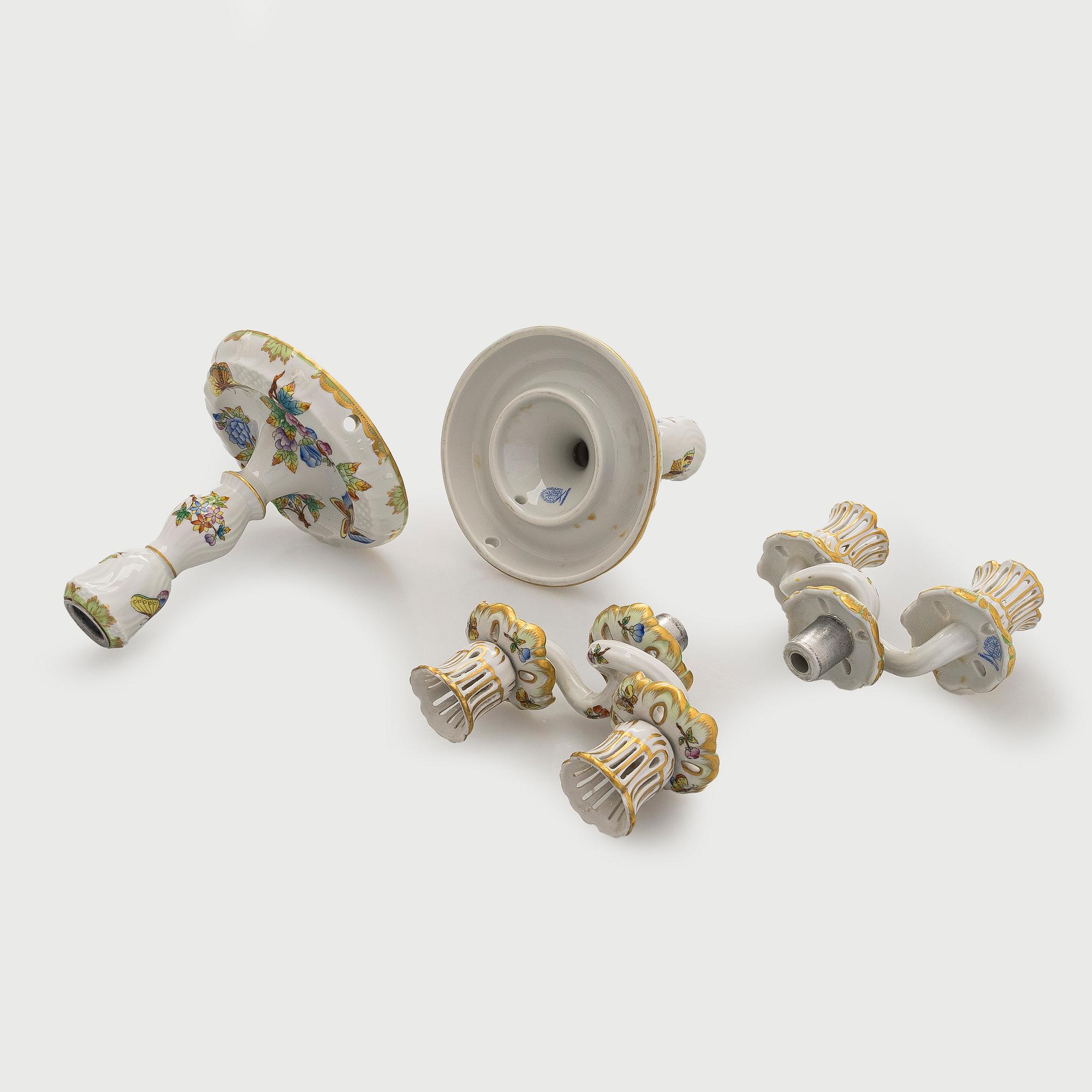 A pair of Herend porcelain candlesticks, and a lidded sugar bowl, Hungary.