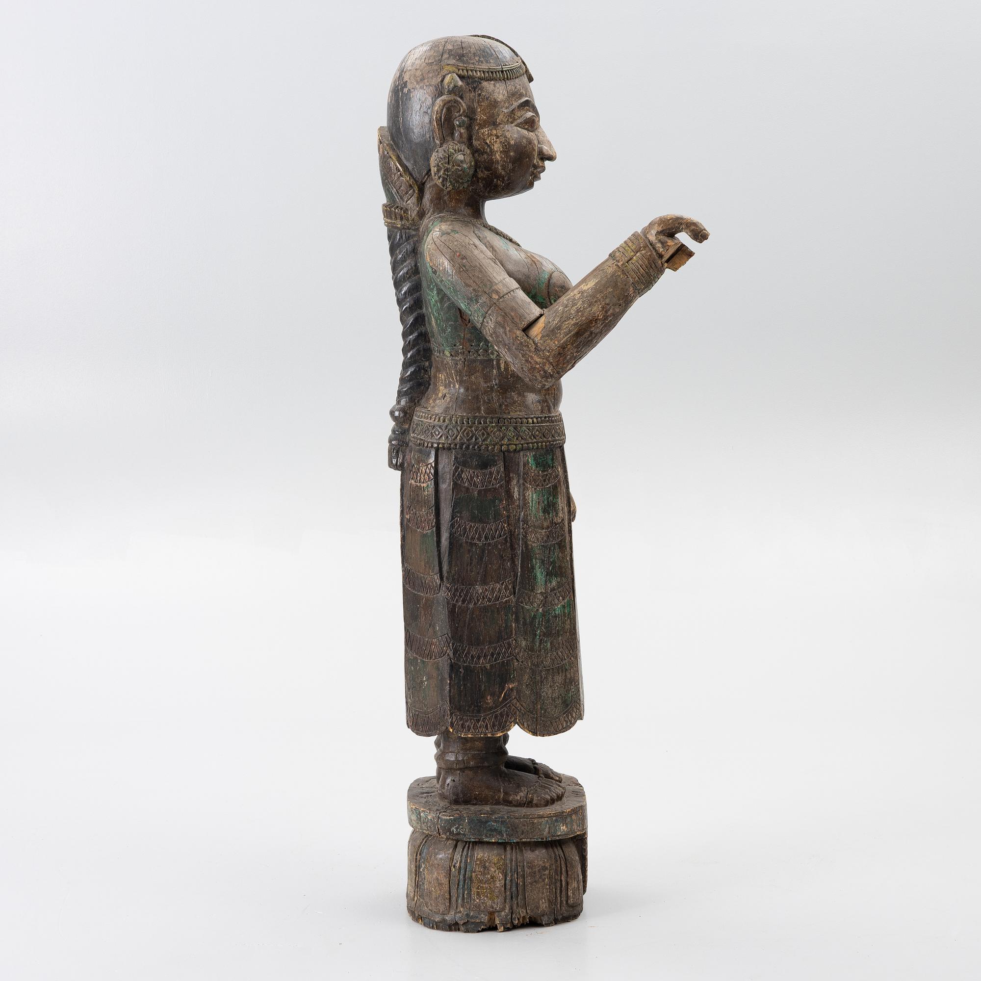 A 20th century wooden sculpture, Cambodia.