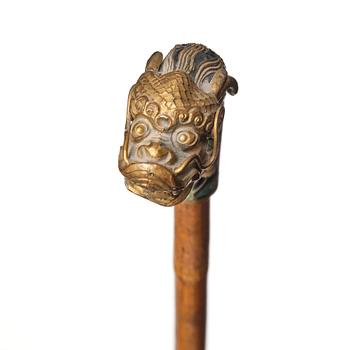 A Chinese bamboo walking cane with a cloisonné handle, late Qing dynasty/early 20th Century.