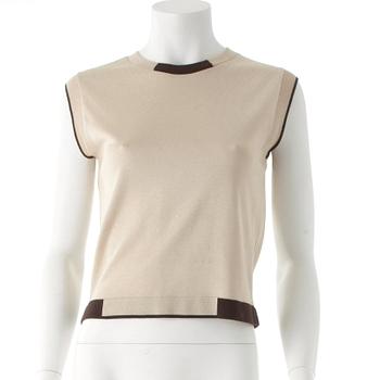 CHANEL, ett tröjset bestående av topp samt cardigan.