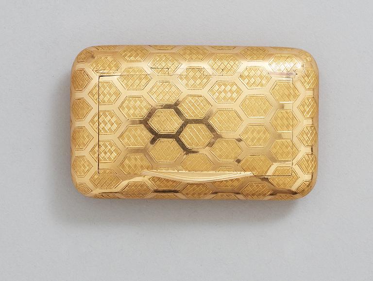 An English 19th century gold snuff-box, marked London 1803.