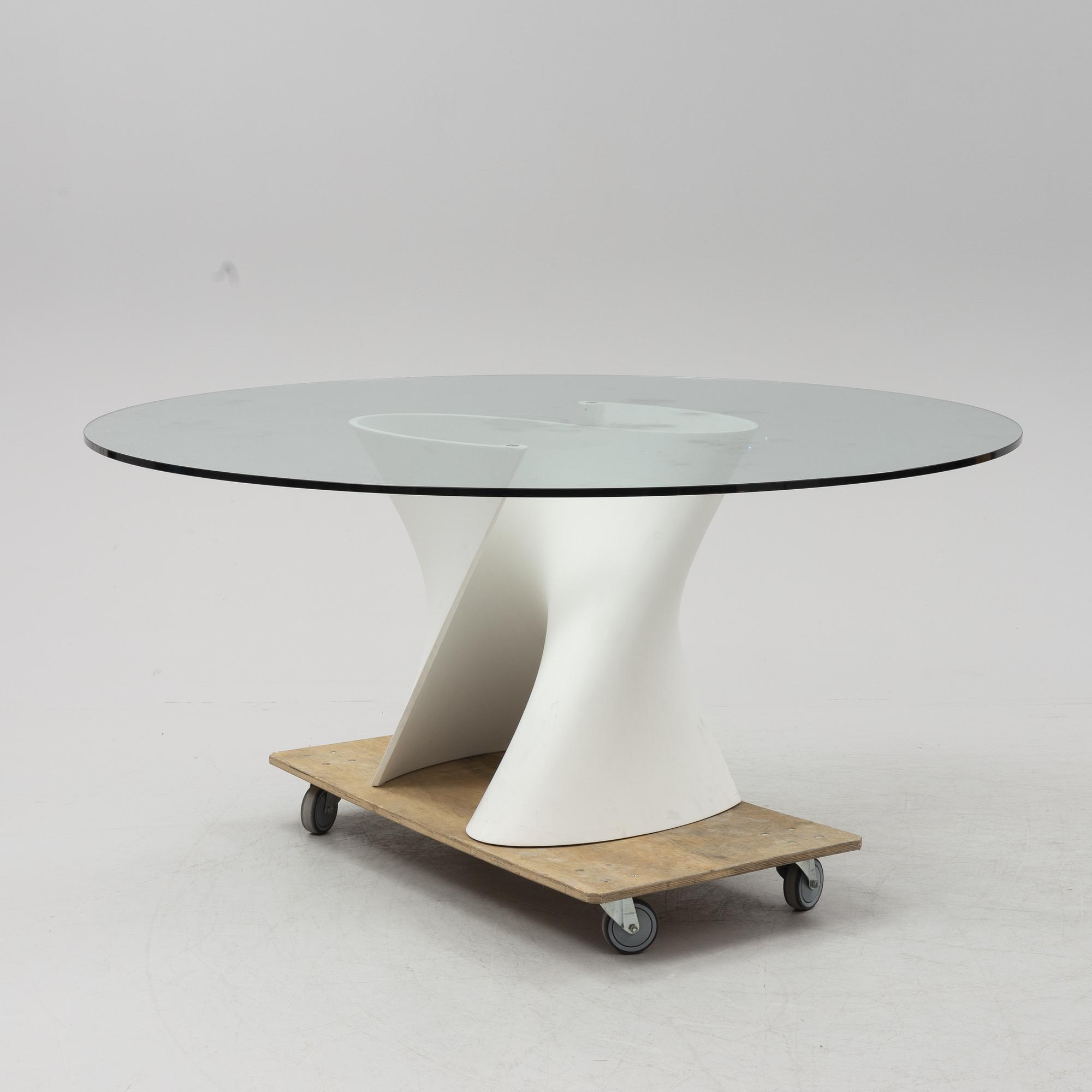 Xavier Lust, a glass top 'S Table' dining table, MDF Italia.