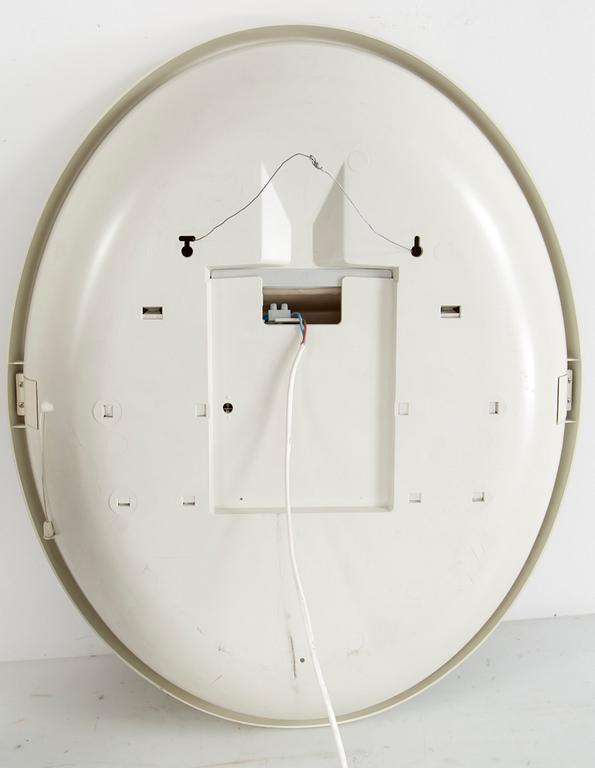 A "SPACE AGE" WALL MIRROR WITH LIGHT BY ALLIBERT, 1970s.