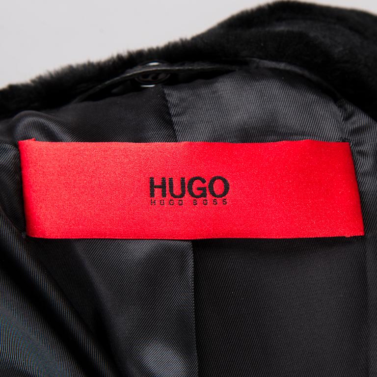 Hugo Boss Ladies Black Leather Trenchcoat in size S.