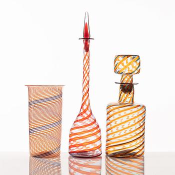 A glass vase and two glass bottles, presumably Murano, Italy.