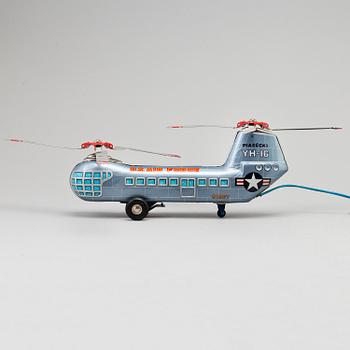 A toy metal car "Sunday Driver", Kosuge, Japan, and "Giant Helicopter", YF, Japan. 1960s.