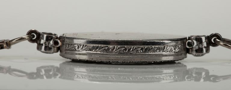 SMYCKESUR, dam. Tissot Locle. 14K guld. Briljant- och 8/8 slipade diamanter ca 1.00 ct. 1920/30-tal. Vikt 17,7 g.