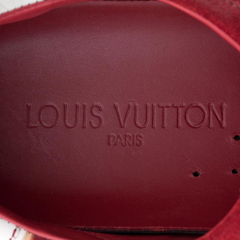 LOUIS VUITTON, a pair of white leather and red suede sneakers.