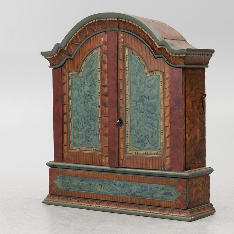 A folk-art cabinet from Värmland, Sweden, dated 1806.