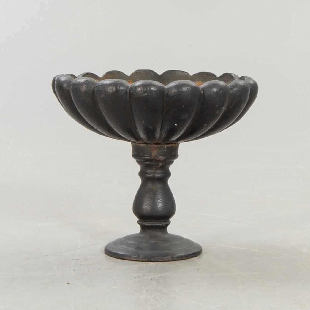 A cast iron bird bath 20th century.