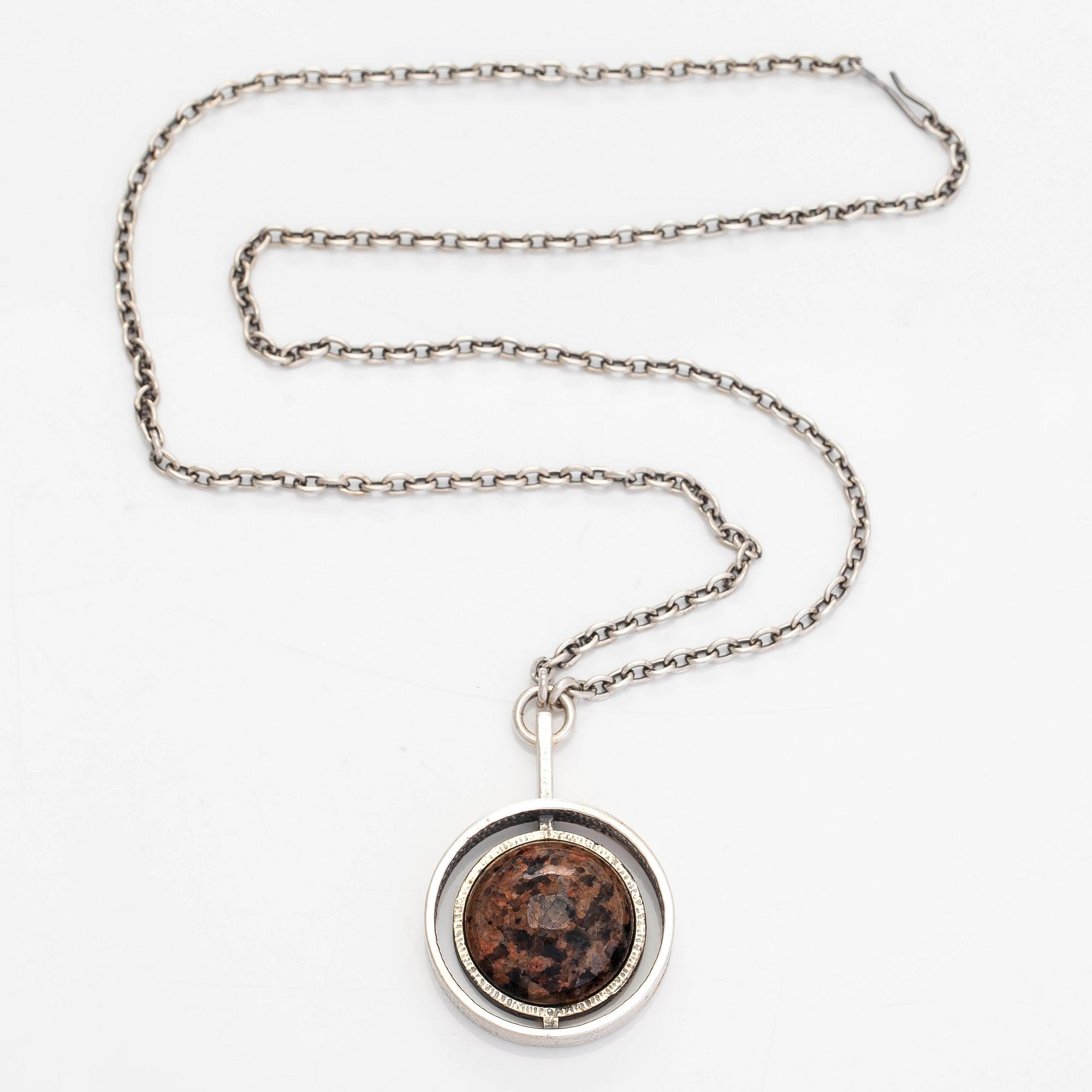 Helena Tynell, a silver and granite necklace with pendant, Turun Hopea, Turku 1975.