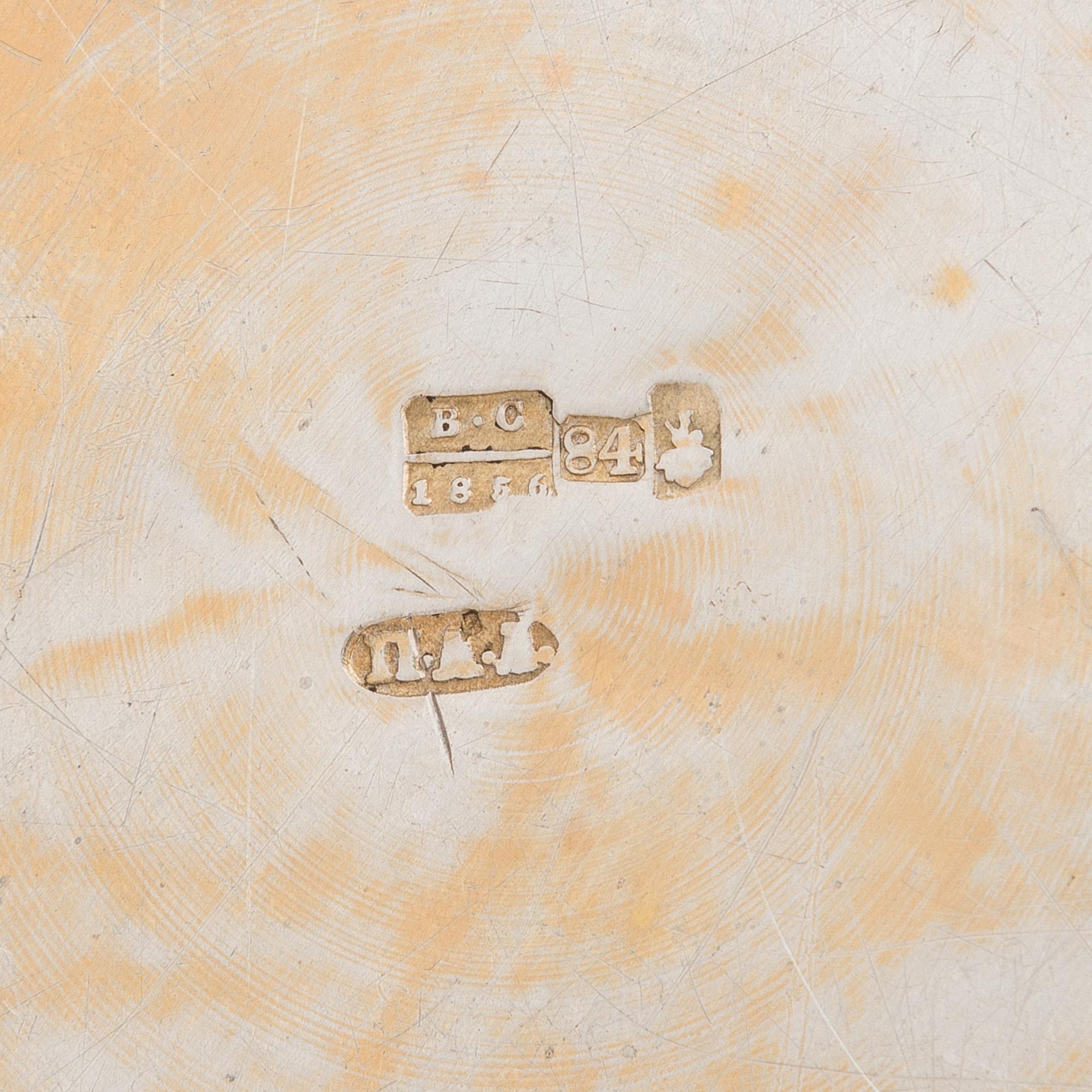 A parcel-gilt silver tray, Moscow 1856.