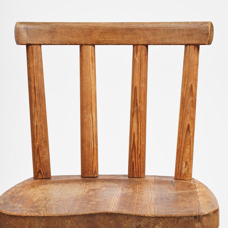 Axel Einar Hjorth, a set of seven stained pine "Utö" chairs, Nordiska Kompaniet, Sweden, 1930s.