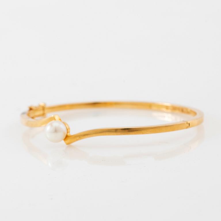 Armring, 18K guld och pärla, Stigbert, Stockholm, 1964.