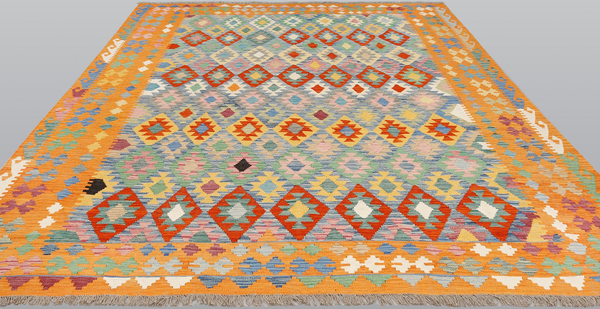 A kilim carpet, ca 342 x 256 cm.