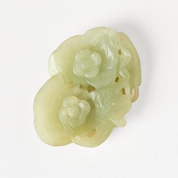 Two archers rings and two nephrite carvings.