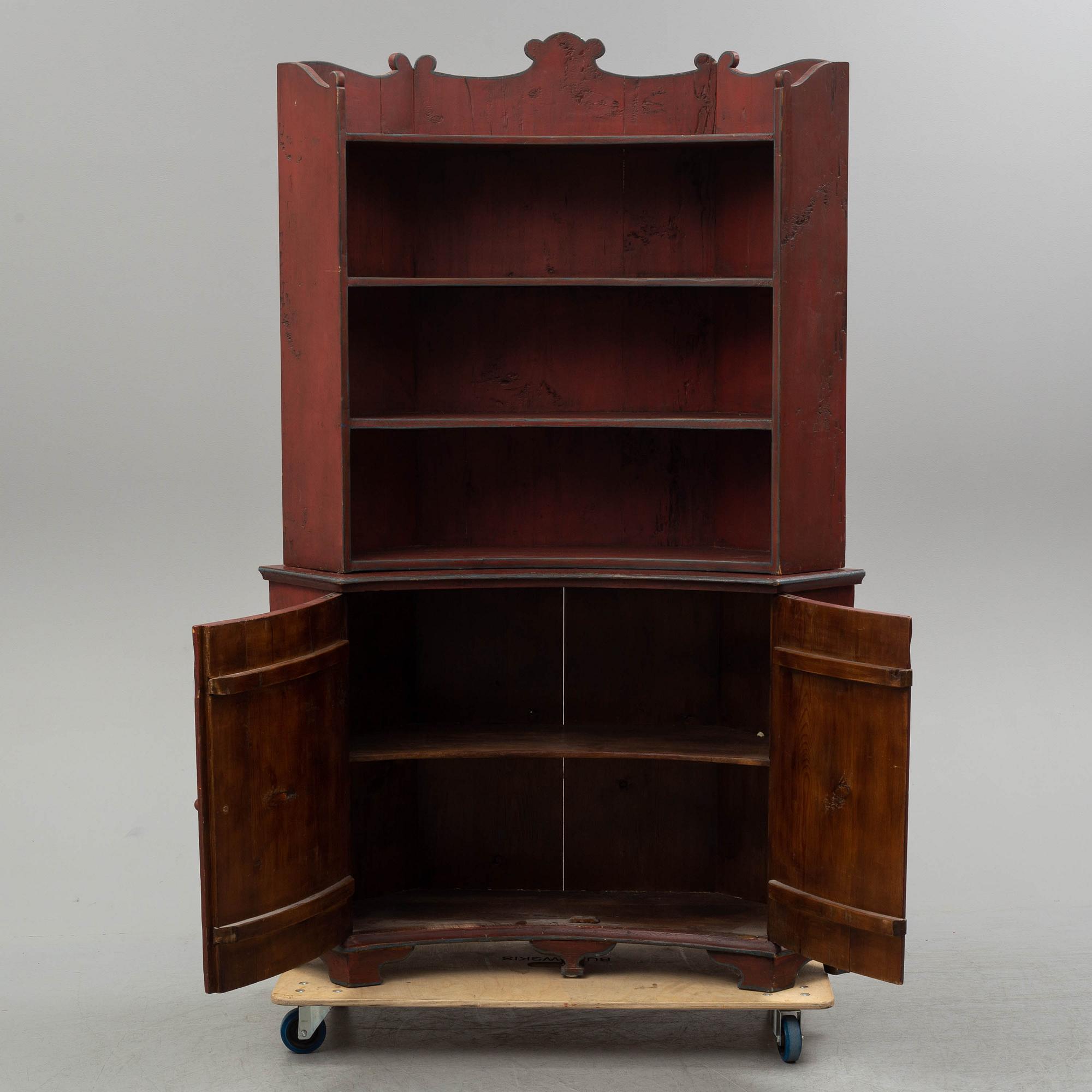 A 19th century corner cupboard.