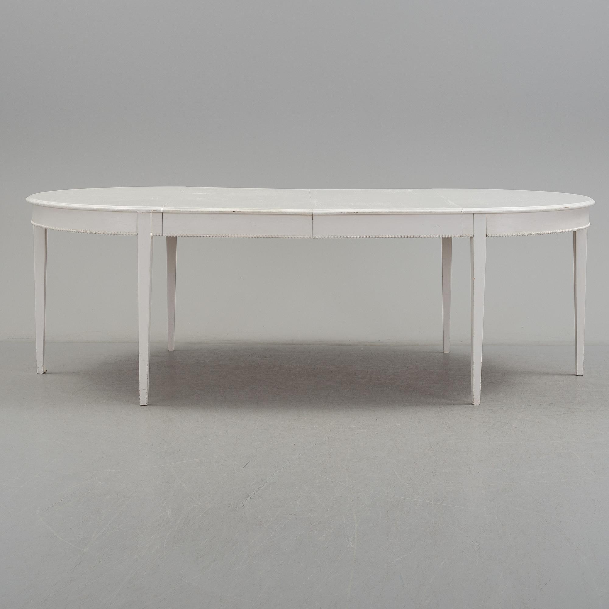 A late 20th century Gustavian style diningtable.