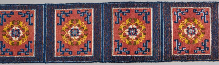 MATTO, a meditation carpet, ten squares, a semi-antique Ningxia, China, ca 598,5 x 62 cm.