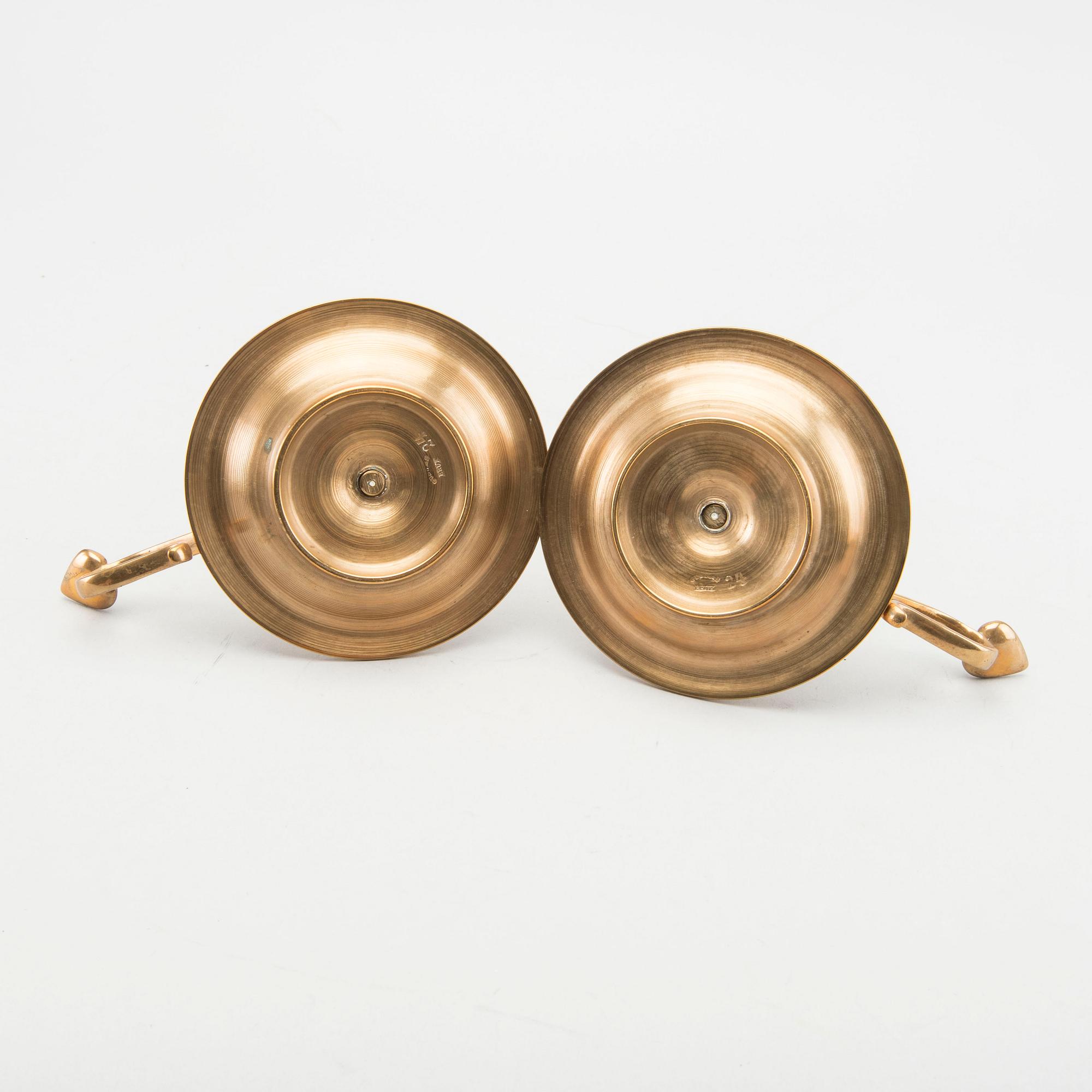 A pair of Gusum brass candelsticks.