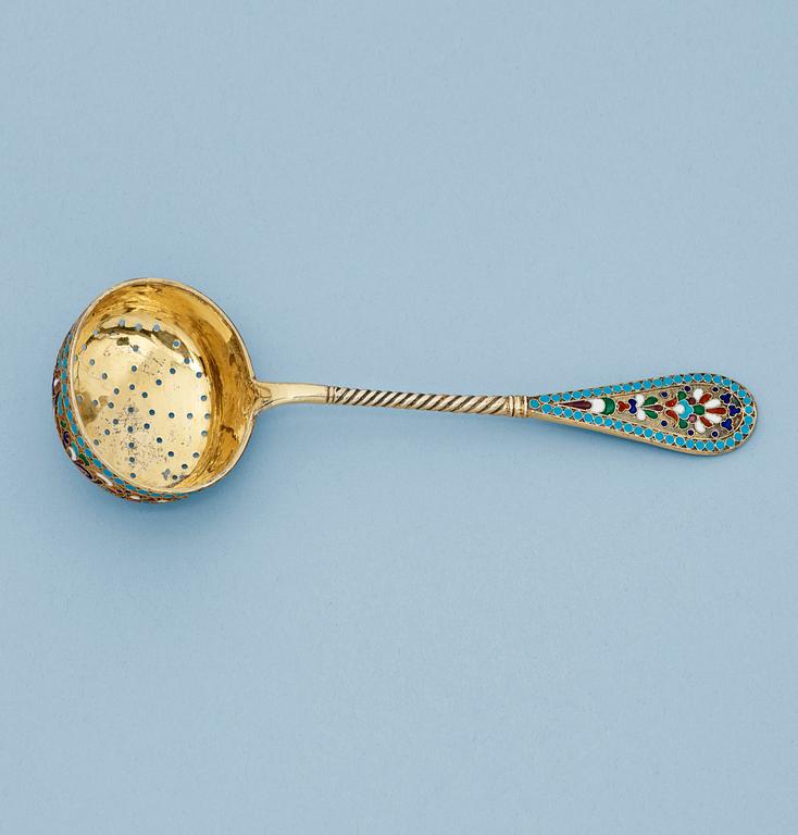 A Russian early 20th century silver-gilt and enamel cane-spoon, unidentified makers mark Moscow 1899-1908.