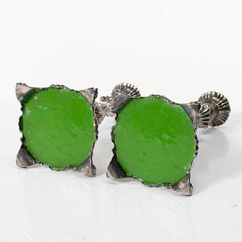 A pair of rococo-style silver candle sticks, early 20th century.