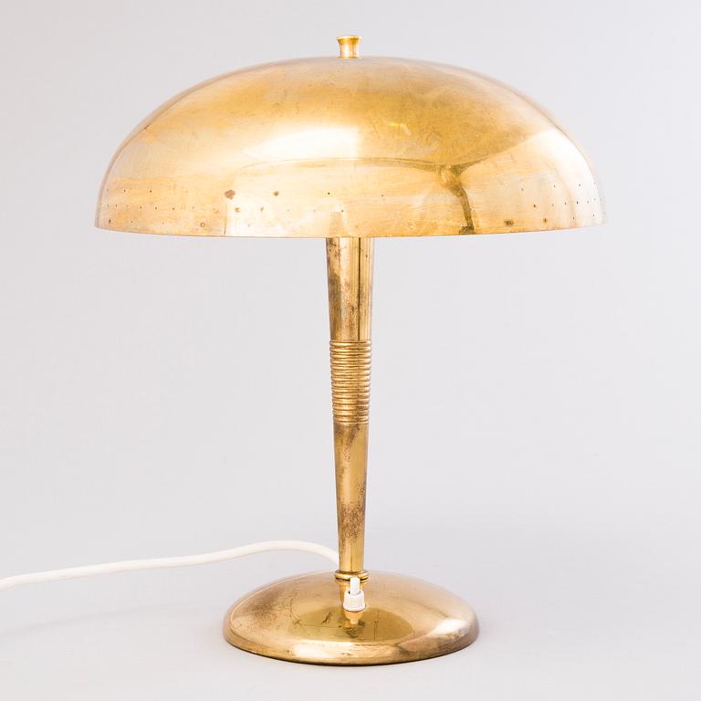 A mid-20th century table lamp for Itsu, Finland.