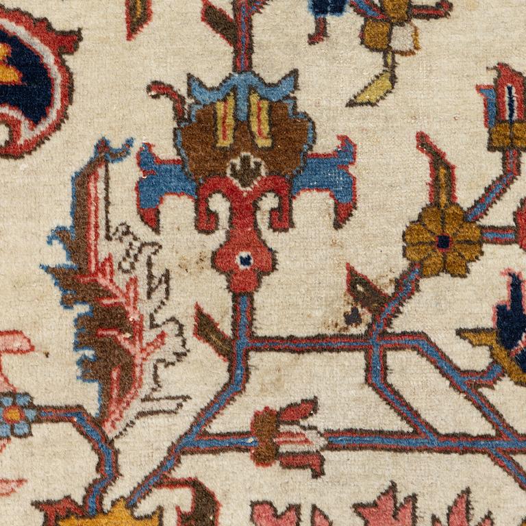 An antique Tabriz carpet, c. 365 x 280 cm.
