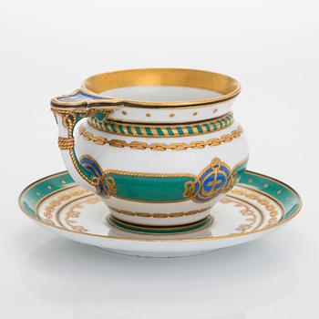 A cup and saucer from the Derzhava service, Imperial Porcelain Manufactory, St. Petersburg, late 19th century.