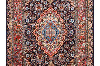 A Kashmar carpet, c. 310 x 203 cm.