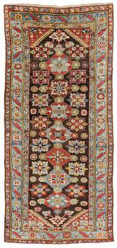 An antique Karabagh carpet,  ca 330 x 157 cm (one end with 1-3 cm flat weave).