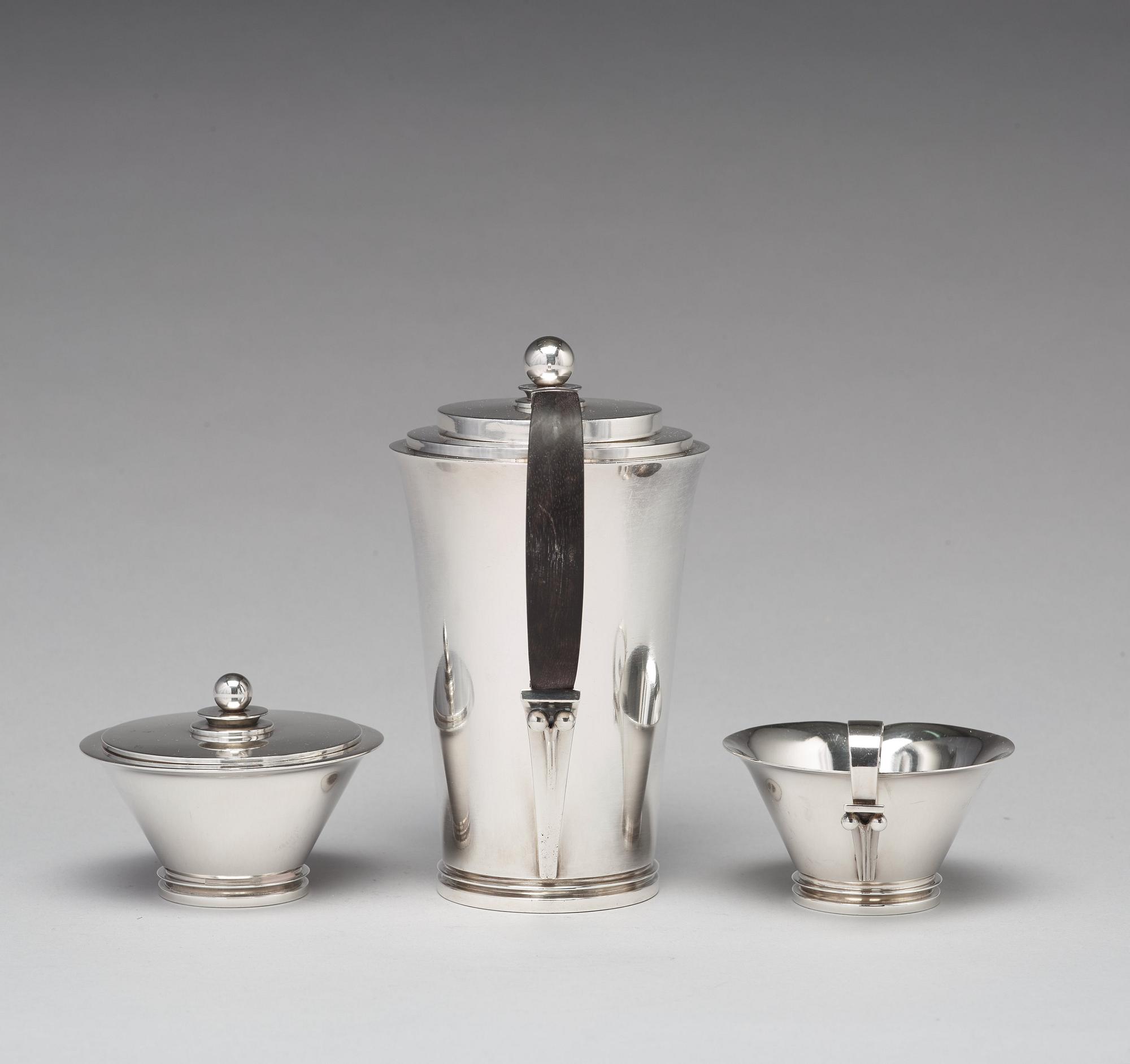Harald Nielsen, a "Pyramid" sterling three pieces coffee service, Georg Jensen, Copenhagen 1933-44, designnr 600A,