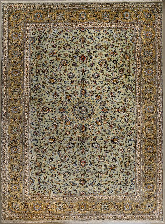 A Keshan rug, signed, 400 x 300 cm.