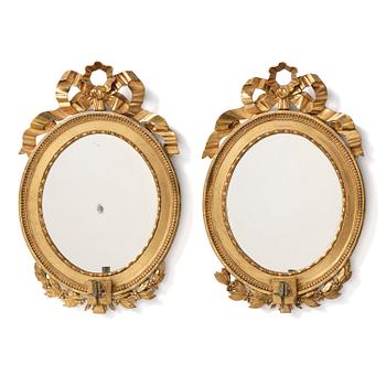 122. A pair of late Gustavian giltwood one light girandoles, Stockholm, circa 1800.