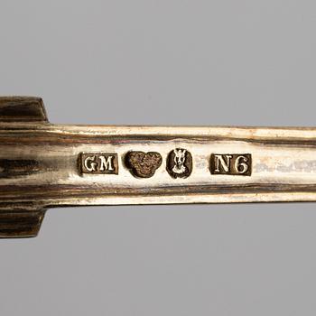Firma Gustav Möllenborg, 6 skedar och 6 gafflar, förgyllt silver, Stockholm 1888-1891. Nyrokoko.