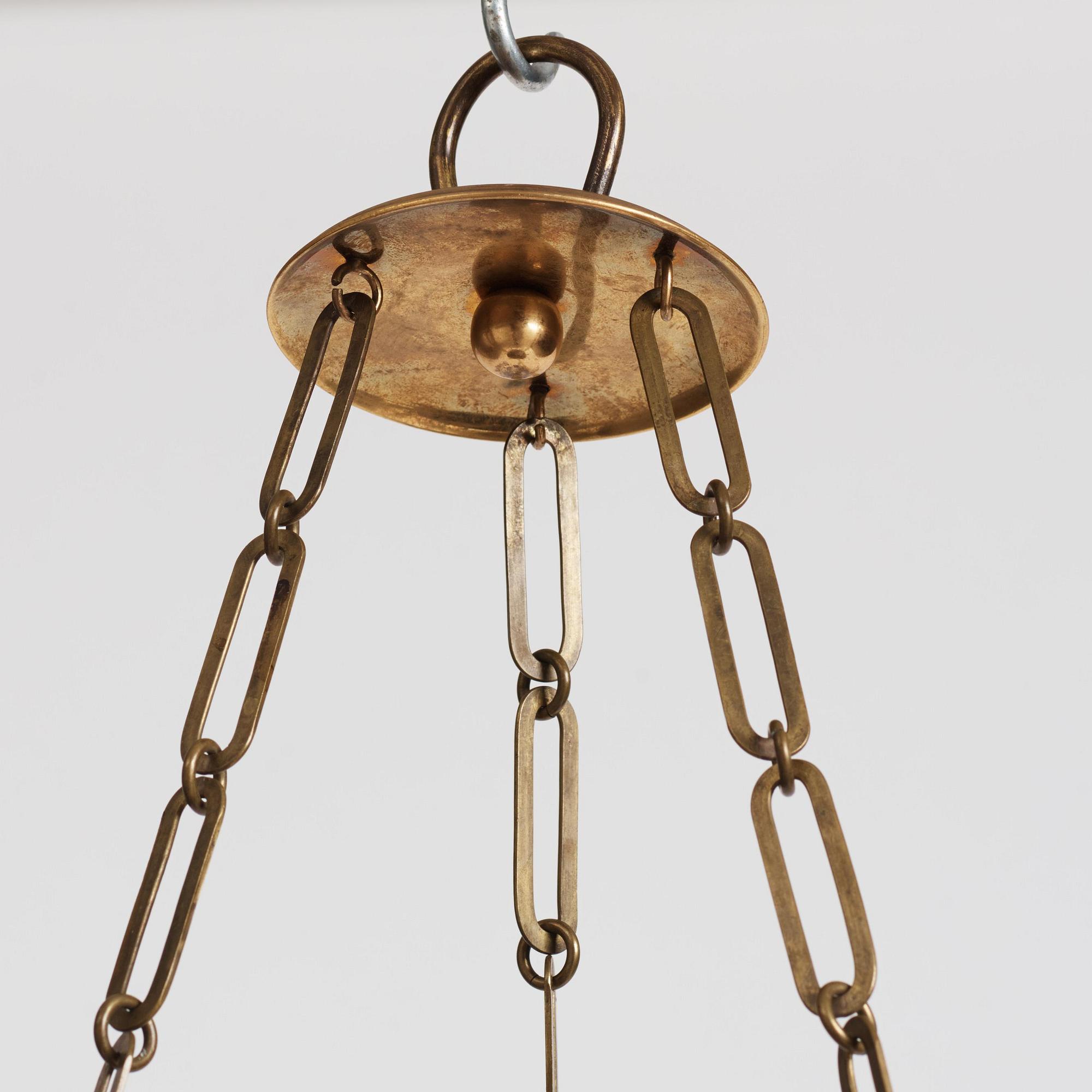 A Swedish Empire ormolu and tole six-branch chandelier, Stockholm, early 19th century.