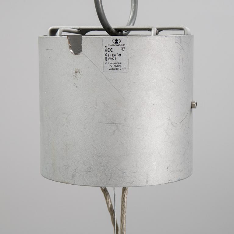 A 'Fil de Fer Ovale' ceiling light by Enzo Cattelini.