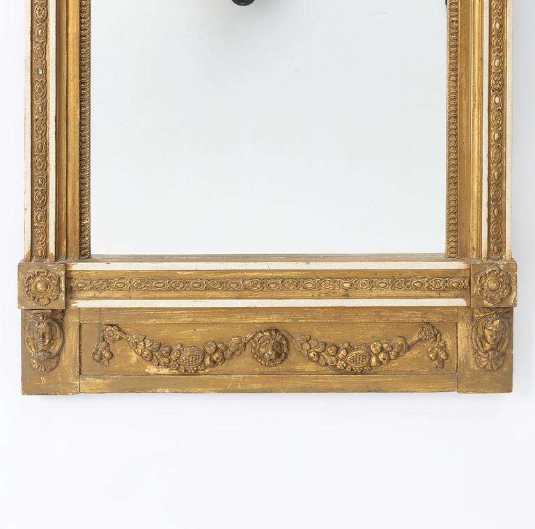 An Empire Mirror, early 19th Century.