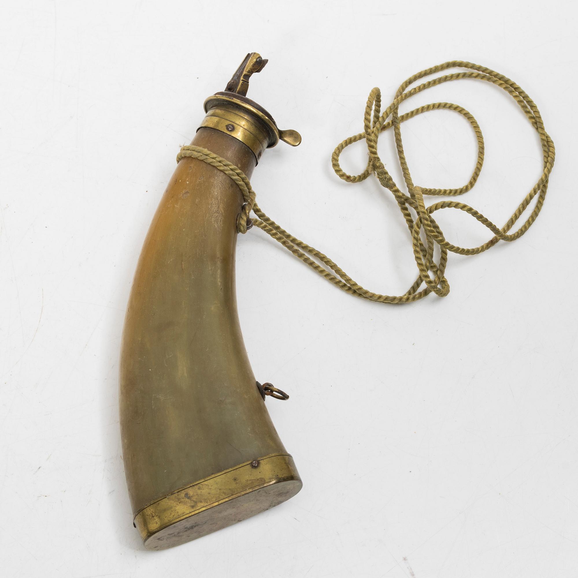 Two percussion cap containers 199th century, and two powder horns.