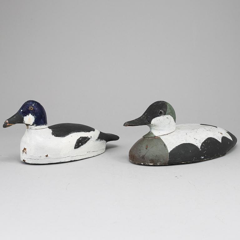 Two painted wood imitation duck,  first half of the 20th century.