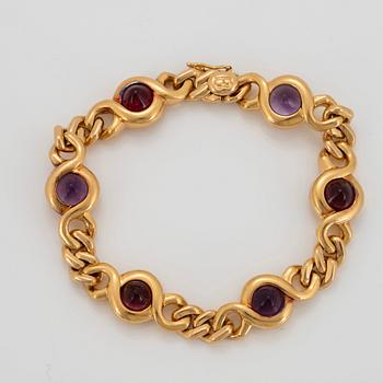 Bulgari armband 18K guld med cabochonslipade ametister och turmaliner.