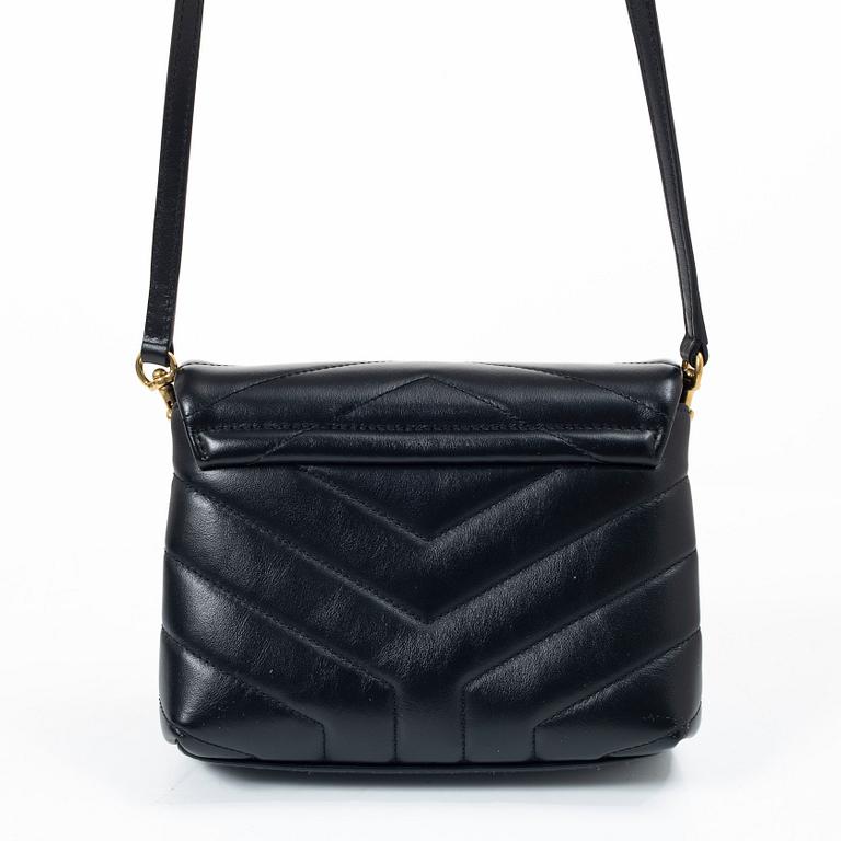 Yves Saint Laurent, a sholder bag.