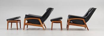 A pair of Folke Ohlsson teak and black leather lounge chairs and ottomans, 'Profil' by Dux, Sweden 1960's.