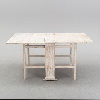A painted gustavian gate-leg table, around the year 1800.