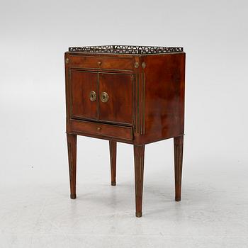 A late Gustavian mahogany-veneered chamberpot cupboard, late 18th century.